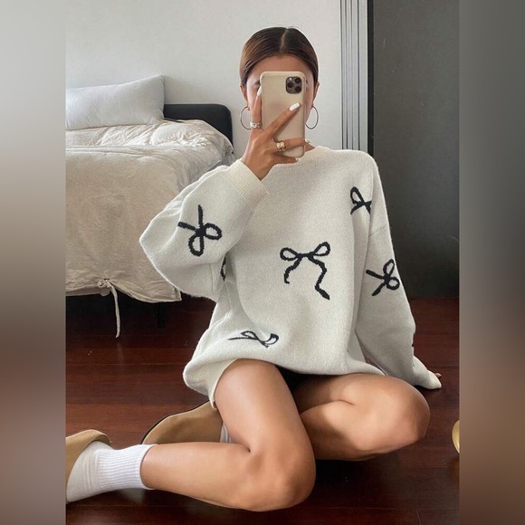 Sweaters - Cream Sweater with Black Bow Design